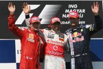 Kimi Räikkönen (Ferrari), Lewis Hamilton (McLaren-Mercedes) und Mark Webber (Red Bull) 