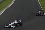 Robert Kubica (BMW Sauber F1 Team) und Sébastien Buemi (Toro Rosso) 