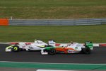 Rubens Barrichello (Brawn) und Adrian Sutil (Force India) 