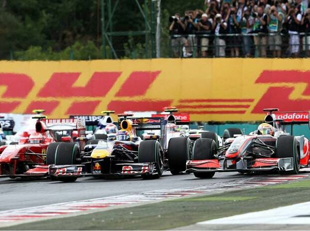 Kimi Räikkönen, Mark Webber und Lewis Hamilton