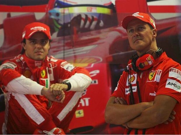 Titel-Bild zur News: Felipe Massa und Michael Schumacher