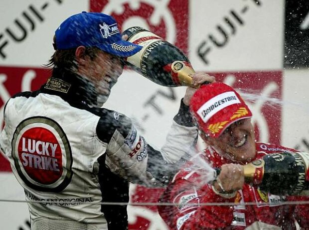 Titel-Bild zur News: Michael Schumacher, Jenson Button 2004