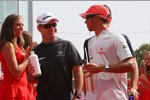 Rubens Barrichello (Brawn) und Lewis Hamilton (McLaren-Mercedes) 