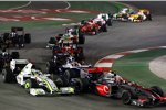 Heikki Kovalainen (McLaren-Mercedes) und Jenson Button (Brawn) 