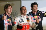 Sebastian Vettel (Red Bull), Lewis Hamilton (McLaren-Mercedes) und Mark Webber (Red Bull)