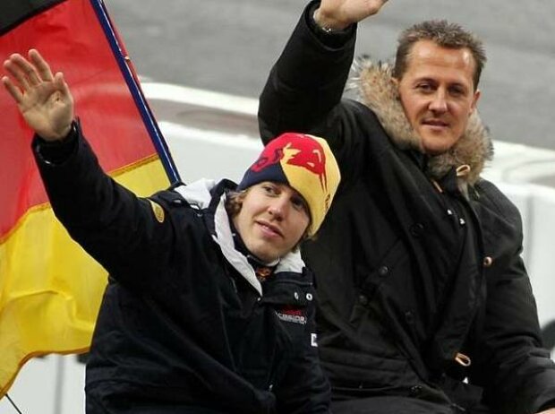 Titel-Bild zur News: Sebastian Vettel und Michael Schumacher