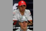 Michael Schumacher (Mercedes) Lewis Hamilton (McLaren) 