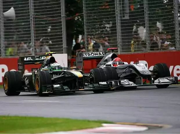 Michael Schumacher, Heikki Kovalainen Titel-Bild zur News: Michael Schumacher, Heikki Kovalainen