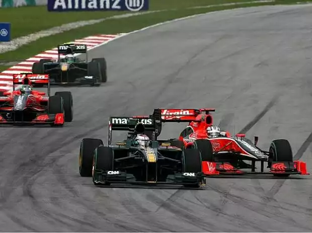 Jarno Trulli, Timo Glock Titel-Bild zur News: Jarno Trulli, Timo Glock