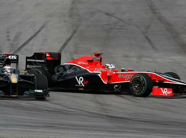 Timo Glock und Jarno Trulli Timo Glock und Jarno Trulli