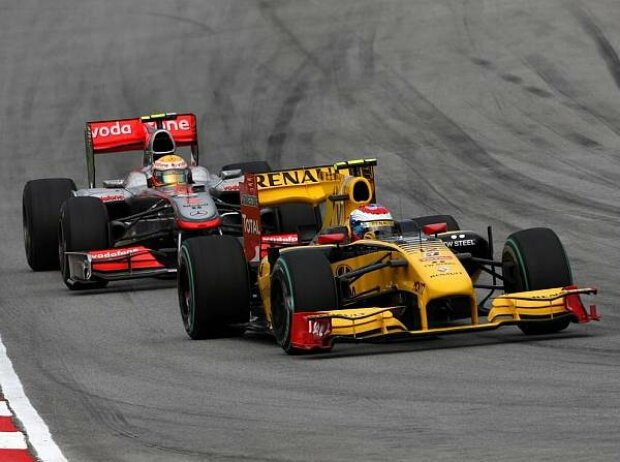 Titel-Bild zur News: Lewis Hamilton, Vitaly Petrov
