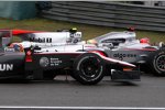 Michael Schumacher (Mercedes), Lewis Hamilton (McLaren) und Karun Chandhok (HRT) 