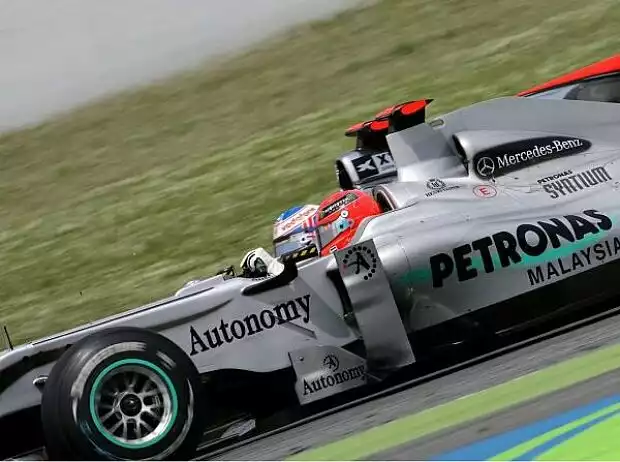 Michael Schumacher und Jenson Button Titel-Bild zur News: Michael Schumacher und Jenson Button