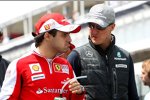 Felipe Massa (Ferrari) und Michael Schumacher (Mercedes) 