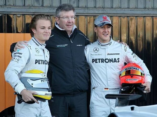 Titel-Bild zur News: Ross Brawn (Teamchef), Nico Rosberg, Michael Schumacher