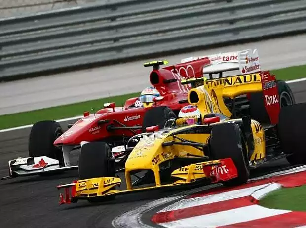 Titel-Bild zur News: Fernando Alonso, Vitaly Petrov