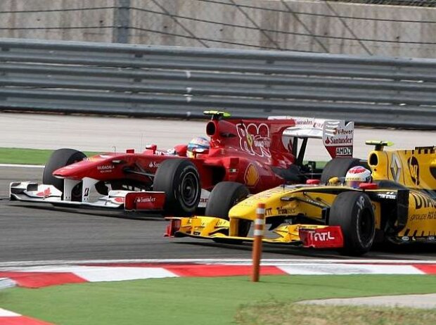 Titel-Bild zur News: Fernando Alonso, Vitaly Petrov