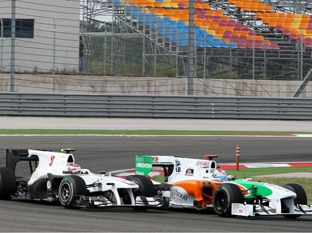 Kamui Kobayashi und Adrian Sutil Kamui Kobayashi und Adrian Sutil