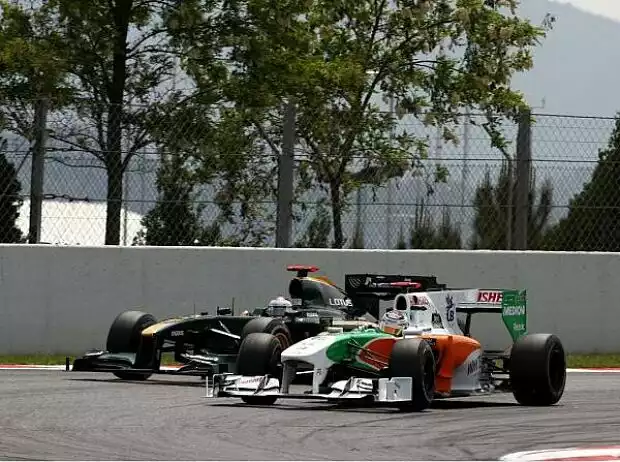 Adrian Sutil und Jarno Trulli Titel-Bild zur News: Adrian Sutil und Jarno Trulli