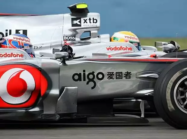 Titel-Bild zur News: Jenson Button, Lewis Hamilton