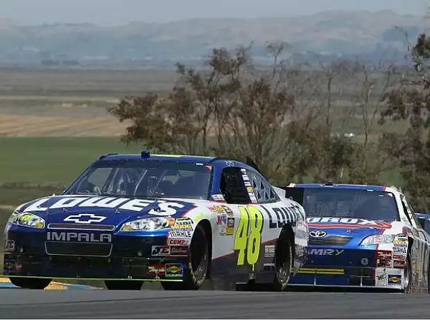 Titel-Bild zur News: Marcos Ambrose, Jimmie Johnson
