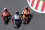 Andrea Dovizioso (Honda), Jorge Lorenzo (Yamaha) und Casey Stoner (Ducati)