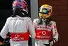 Bild zum Inhalt: Button und Hamilton beim Paintball-Duell