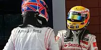 Bild zum Inhalt: Button und Hamilton beim Paintball-Duell