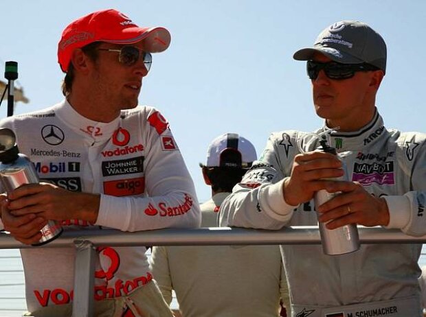 Titel-Bild zur News: Jenson Button und Michael Schumacher