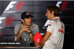 Mark Webber (Red Bull) und Jenson Button (McLaren) 