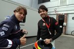 Augusto Farfus (BMW Team RBM) begrüßt seinen brasilianischen Landsmann Carlos Bueno (Chevrolet) in der WTCC