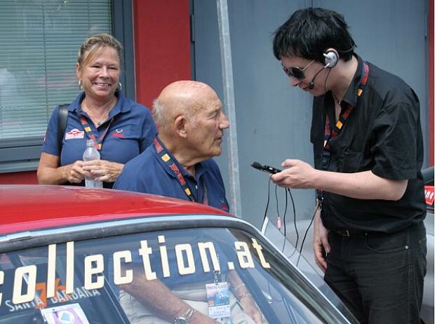 Susie und Stirling Moss mit Michael Noir Trawniczek Susie und Stirling Moss mit Michael Noir Trawniczek