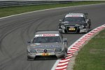 Bruno Spengler (HWA-Mercedes) vor Timo Scheider (Abt-Audi) 
