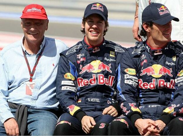 Titel-Bild zur News: Niki Lauda, Sebastian Vettel, Mark Webber