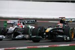 Michael Schumacher (Mercedes) und Jarno Trulli (Lotus) 