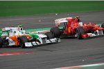 Vitantonio Liuzzi (Force India) und Fernando Alonso (Ferrari) 