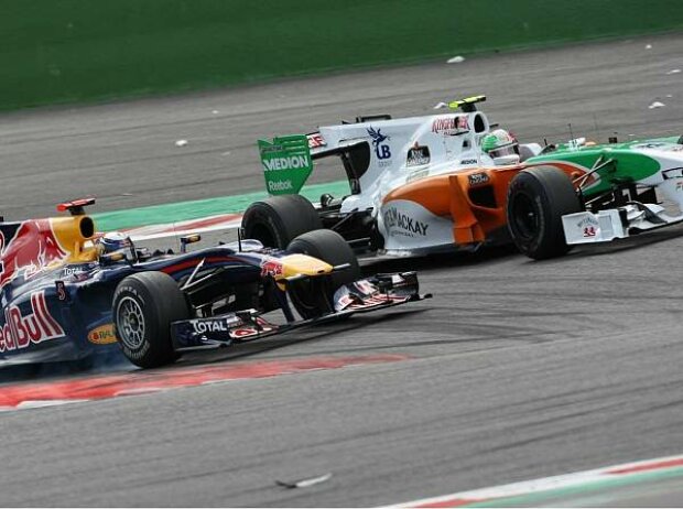 Sebastian Vettel und Vitantonio Liuzzi Sebastian Vettel und Vitantonio Liuzzi