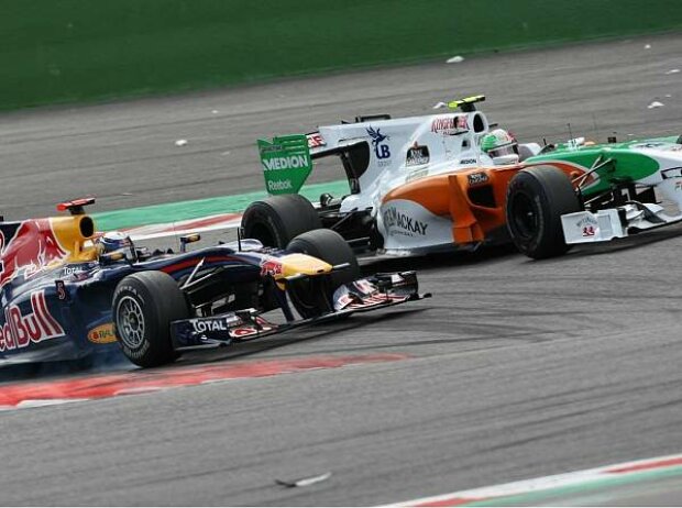 Sebastian Vettel und Vitantonio Liuzzi