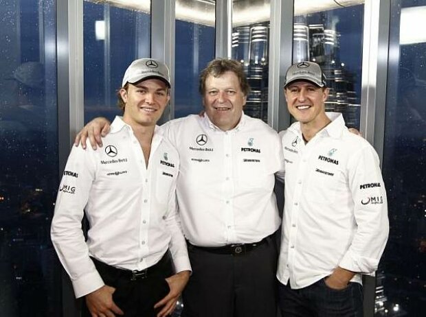Titel-Bild zur News: Nico Rosberg, Norbert Haug und Michael Schumacher