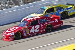 Juan Pablo Montoya (EGR) Travis Kvapil (Front Row) 