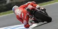Bild zum Inhalt: Pole-Position: Stoner beschenkt sich selbst