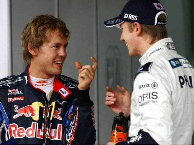 Titel-Bild zur News: Sebastian Vettel und Nico Hülkenberg