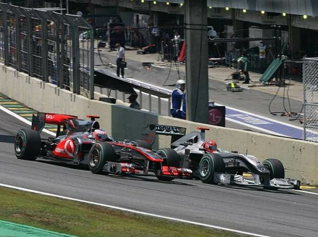 Jenson Button und Michael Schumacher Jenson Button und Michael Schumacher