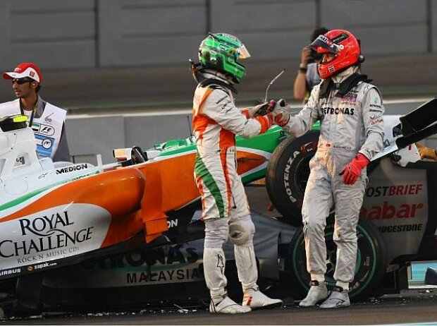 Titel-Bild zur News: Vitantonio Liuzzi und Michael Schumacher