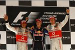 Lewis Hamilton (McLaren), Sebastian Vettel (Red Bull) und Jenson Button (McLaren) 