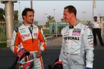 Vitantonio Liuzzi (Force India) und Michael Schumacher (Mercedes)