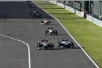 Schon wieder die beiden Streithähne: Michael Schumacher (Mercedes) vs. Rubens Barrichello (Williams) in Suzuka