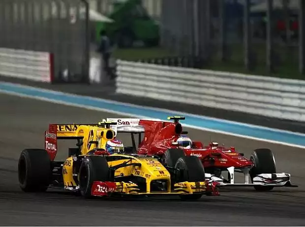 Fernando Alonso, Vitaly Petrov Titel-Bild zur News: Fernando Alonso, Vitaly Petrov
