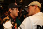 Erster Gratulant beim neuen Weltmeister Sebastian Vettel: Michael Schumacher gönnt seinem Landsmann und Freund den Erfolg