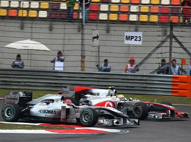 Michael Schumacher, Lewis Hamilton Michael Schumacher, Lewis Hamilton